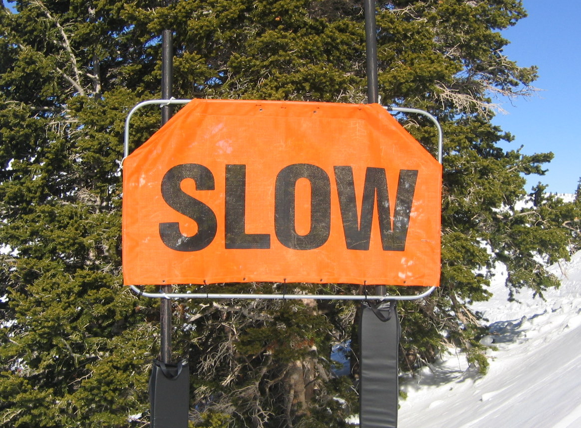 Ski Trail Sign for Slowing Down