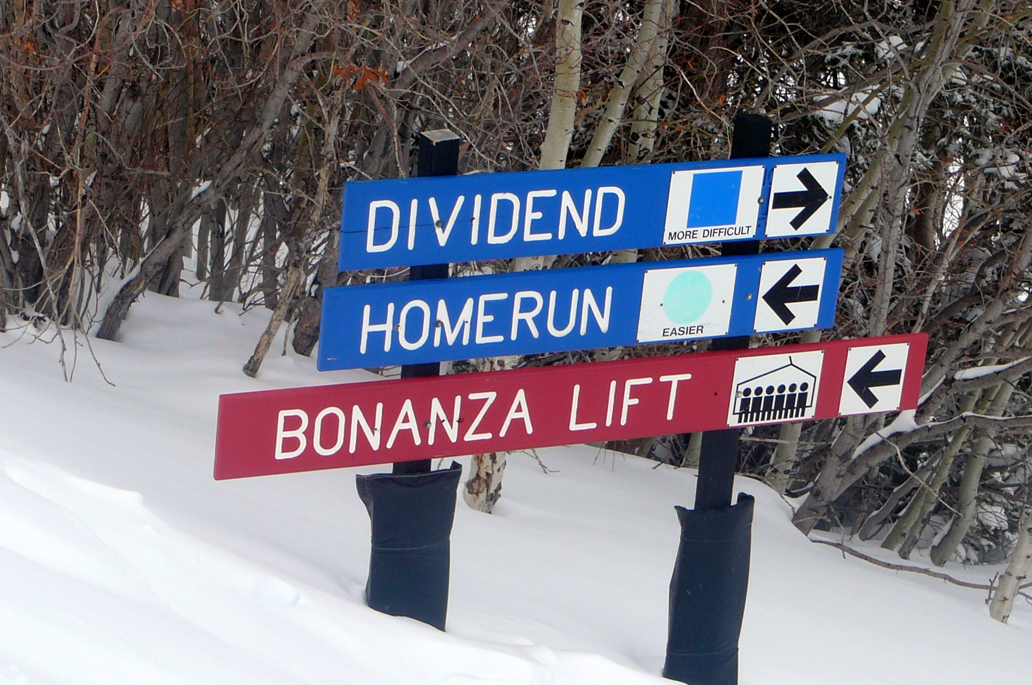 blue and red molded fiberglass trail run signs 